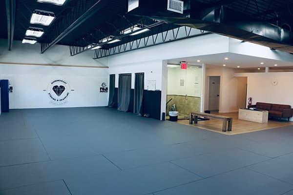 BJJ mat floor with Diamondheart logo at Diamondheart Brooklyn