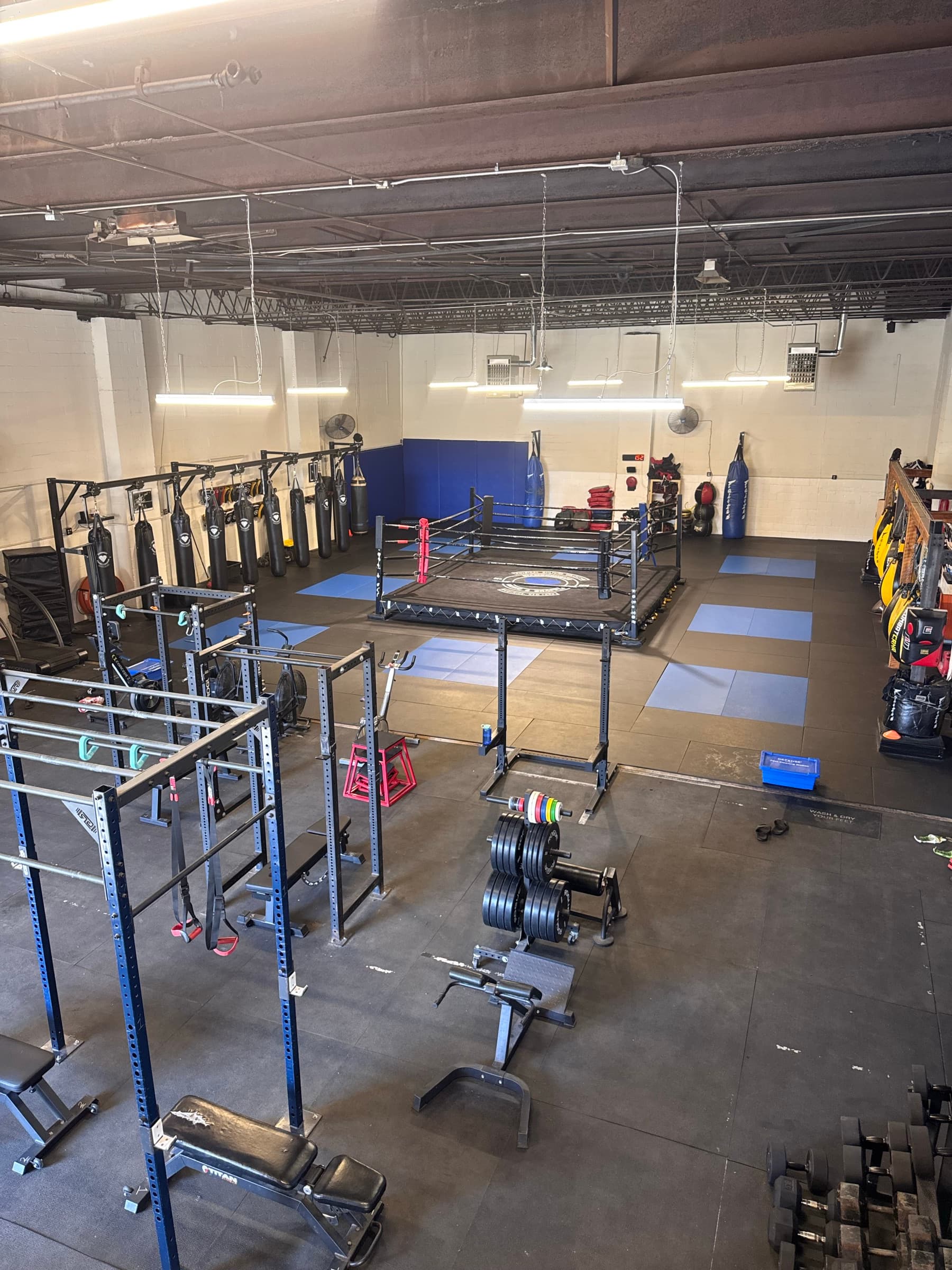 Gym floor with racks and equipment at Diamondheart Brooklyn